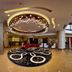 Grand Metropark Hotel Shangqiu lobby with circular chandelier, polished floors and grand staircase