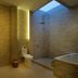Bali Nyuh Gading Luxury Villas & Spa bathroom with open shower, tub, toilet and skylight in North Kuta