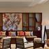 Sheraton Mallorca Arabella Golf Hotel lounge in Palma de Mallorca with patterned seating and a decorative wall feature.