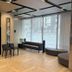 Dormy Inn Premium Hakata Canal City Mae Natural Hot Spring lobby in Fukuoka with seating and large windows