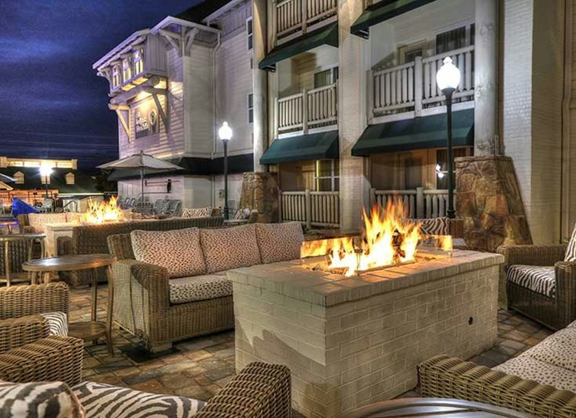 Lodge at Five Oaks Pigeon Forge patio with fire pit and outdoor seating at night