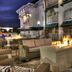 Lodge at Five Oaks Pigeon Forge patio with fire pit and outdoor seating at night
