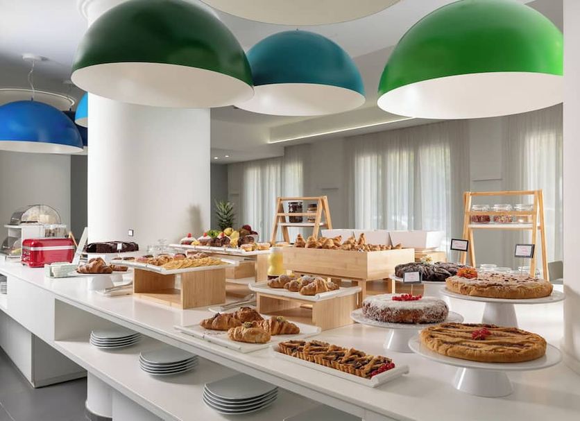 Love Boat in Riccione breakfast buffet with pastries on a bright dining counter
