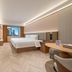 Home Inn Chongqing Yangjiaping Pedestrian Street guest room with city view and double bed in Chongqing
