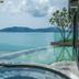 Conrad Koh Samui infinity pool overlooking the turquoise sea and distant island in Ko Samui