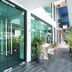 OYO 90151 Hill Inn Batu Caves entrance with glass doors and covered walkway in Batu Caves