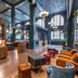 Hotel Indigo Nashville - The Countrypolitan By IHG lobby with lounge seating and tall arched windows