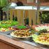 Pestana São Paulo buffet with chef arranging fresh salads and appetizers in Sao Paulo