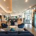 Novotel Melbourne Glen Waverley lobby lounge with seating and front desk in Glen Waverley