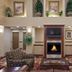 Holiday Inn Express & Suites Bowling Green lobby seating area with fireplace and wall-mounted TV
