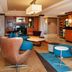 Fairfield Inn & Suites by Marriott Colorado Springs North/Air Force Academy lobby with seating and front desk
