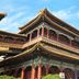 Mingcheng Hotel Beijing in Beijing with ornate traditional Chinese-style architecture and blue sky