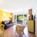 Club Belambra Le Vidourle in Le Grau-du-Roi with a bright living room and patio doors to a garden