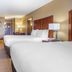 Comfort Inn and Suites Beaver - Interstate 15 North room with two queen beds and seating area