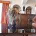 Villablanca Garden Beach Hotel in Cozumel, lounge with sofa, arched windows, and glass coffee table