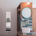 Médousa Suites in Taormina bathroom vanity with twin sinks, round mirrors and a narrow wall mirror