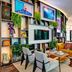 citizenM Miami World Center lobby with colorful seating, shelving, and large windows in Miami