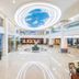 Grand Bayview Hotel Ningbo lobby with circular skylight, glossy marble floors and seating area