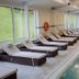 Mercure Aberdeen Ardoe House indoor pool with rows of lounge chairs in Aberdeen