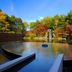 Aomoriya by Hoshino Resorts in Misawa, circular outdoor pool with waterfall and autumn trees