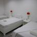 Coron Sanho Pension House in Coron: simple room with three single beds and white linens