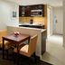 Residence Inn by Marriott Montreal Downtown suite with kitchenette and dining table in Montreal