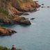 Rocky coastline and calm bay view at The Old Government House Hotel & Spa in Saint Peter Port