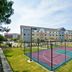 TownePlace Suites by Marriott Dallas Lewisville in Lewisville with outdoor basketball court and hotel building