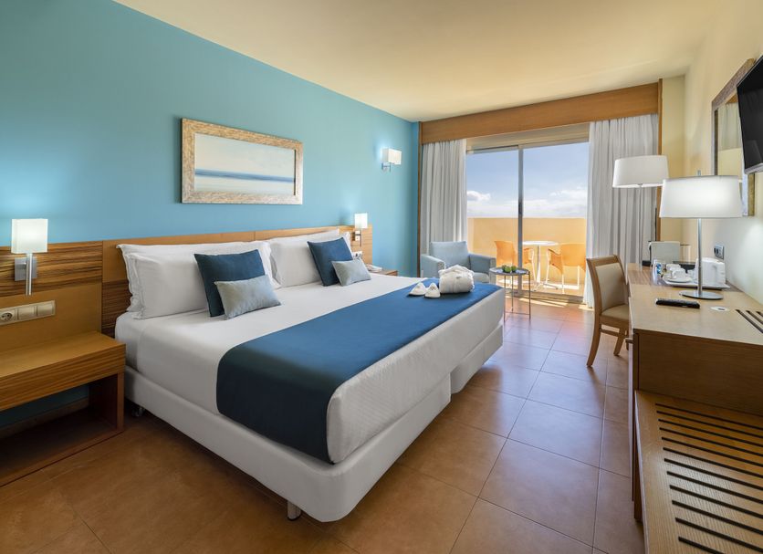 Elba Carlota Beach & Golf Resort Antigua guest room with balcony ocean view