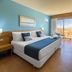 Elba Carlota Beach & Golf Resort Antigua guest room with balcony ocean view