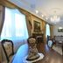 Park Hotel Zamkovy, Gomel: elegant dining room with chandelier, long table, ornate chairs and fireplace