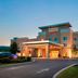 Fairfield Inn & Suites by Marriott Huntingdon Route 22/Raystown Lake exterior at dusk with lit entrance