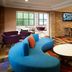 Fairfield Inn & Suites by Marriott Indianapolis East lobby with colorful seating and bar stools