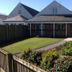 Hillhead Farm Lets in Stirling with a landscaped garden, lawn, path, and covered outdoor structure