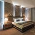 Sky Blue Hotel & Spa, Ploiești: modern guest room with king bed, bedside lamp, and floor-to-ceiling curtains