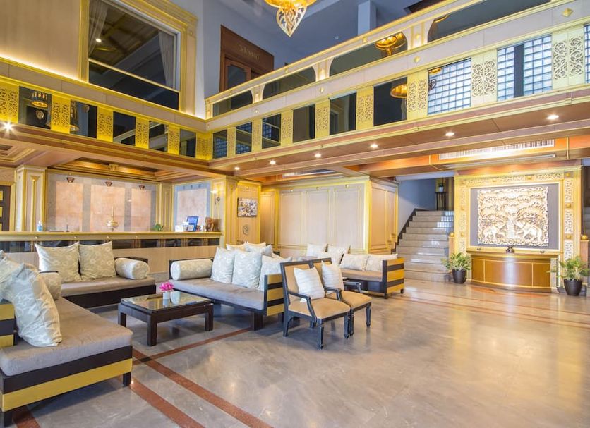 Tohsang Heritage Ubon Hotel lobby in Ubon Ratchathani with grand seating area and staircase