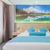 Marriott Hotel Yunfu guest room with king bed and scenic lake wall art