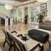 Hilton Grand Vacations at McAlpin-Ocean Plaza lobby seating area with large windows in Miami Beach