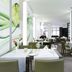 Novotel Frankfurt City restaurant in Frankfurt am Main with modern tables and green chairs