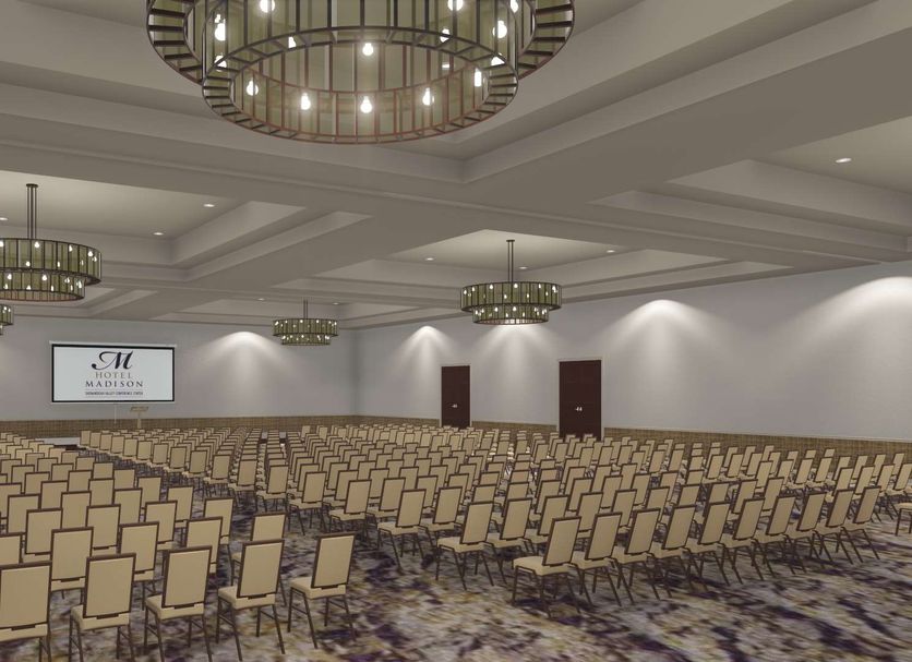 Hotel Madison & Shenandoah Conference Ctr. in Harrisonburg meeting room with rows of banquet chairs