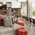 Home2 Suites by Hilton Chicago McCormick Place lounge with bar seating and large windows in Chicago