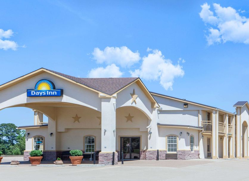 Days Inn by Wyndham Centerville exterior with arched entrance and star accents in Centerville