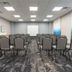 Hampton Inn Santa Clarita-Valencia meeting room with rows of chairs and projection screen