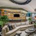 Grand Fiesta Americana Guadalajara Country Club lobby lounge with curved sectional seating and illuminated bar