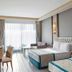Tui Magic Life Jacaranda Side guest room with two beds and balcony doors