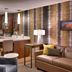 Residence Inn by Marriott Salt Lake City-West Jordan suite with kitchenette, sofa, and dining counter