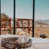 Contemplacion Resort & Spa in Ensenada spa treatment room with desert mountain views through tall windows