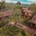 Posada Puerto Bemberg in Puerto Libertad with red-tile villas and lush tropical courtyard views