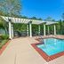 Hilton Vacation Club Greensprings Williamsburg pool with pergola and lounge chairs