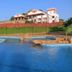Kadambavanam Ethnic Village Resort in Madurai with hillside pool and resort building